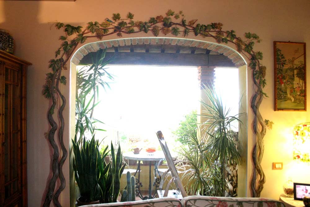 Trompe l'oeil di un tralcio d'uva